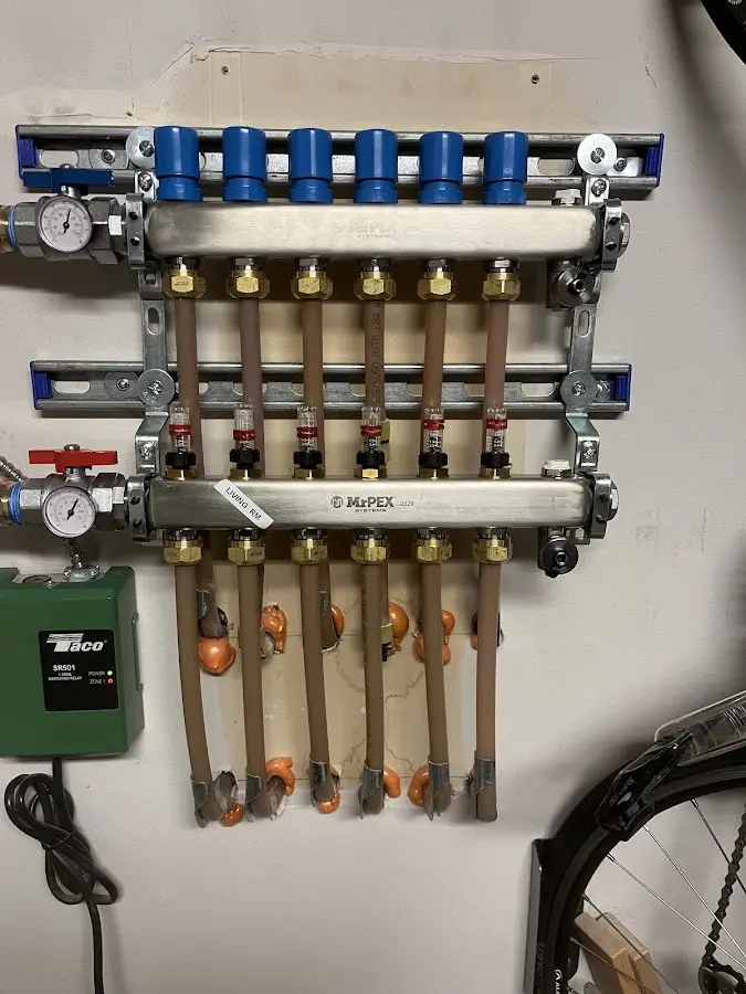 Plumber performing Gas Line Installation at a residential property in Fayetteville